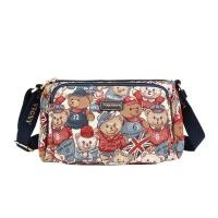 ราคา กระเป๋าสะพายข้างมีหลายช่องลายหมีน้อยนิชแบรนด์ลายหมีพูห์สำหรับผู้หญิงกระเป๋าสะพายไหล่ผ้าใบปักลายความจุใหญ่แมทช์ลุคง่ายกระเป๋าคุณแม่ (16136085219)