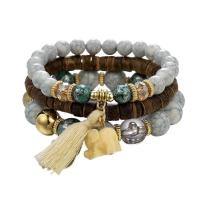 ราคา กำไลข้อมือและกำไลข้อมือลายช้างลูกปัดไม้สไตล์โบฮีเมียนเครื่องประดับโบราณชนเผ่าแบบชาวโบฮีเมียนหลายชั้น (18321788042)