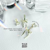 ราคา Nice Accident Blink Heart Bow Stud Earrings ต่างหูดีไซน์พิเศษ ถอดแยกชิ้นได้ ประดับ gems หัวใจ (21420857070)
