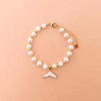 ราคา สร้อยข้อมือมุกธรรมชาติประดับด้วยชาร์มเปลือกหอย (12489775048)