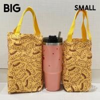 ราคา กระเป๋าถือ ผ้าแคนวาส ถุงใส่แก้วน้ำ ถุงผ้าแคนวาส ทรงสูงพร้อมฐานรองพลาสติก ลายการ์ตูน (18270377502)