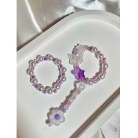 ราคา สายรัดเข็มขัด ที่รัดเข็มขัดลูกปัดโทนสีม่วง (21549756032)