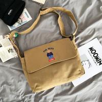 ราคา กระเป๋าสะพายข้างผู้หญิงผ้าแคนวาสสไตล์ญี่ปุ่นสไตล์วิทยาลัยน่ารักลายการ์ตูนปักลายหมีนักเรียน (21571668143)