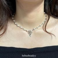 ราคา ? สร้อยมุก พร้อมจี้โบว์สีเงิน สร้อยลูกปัดมุกคั่นเงิน พร้อมจี้โบว์ สร้อยโบว์ (21943402697)