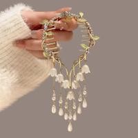 ราคา 2023 new lily of the valley hollow tassel hair clip womens high end sense diamond studded high ponytail hairball hair clip at the back of the head (21980520321)