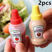 ราคา ภาชนะใส่สลัดซอสแบบพกพา2ชิ้นขวดบีบซอสขนาดเล็ก25มล สำหรับกล่องข้าวกลางวันขวดบีบปรุงรสพลาสติก (17960901151)