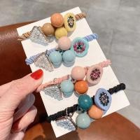 ราคา Caribbean sunshine ยางรัดผมแฟชั่น ประดับไข่มุกคริสตัล สีพาสเทลน่ารัก สำหรับผู้หญิง Korean hair ties fashion hair ring rubber band girl ponytail hair rope (22246868498)