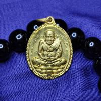 ราคา เหรียญหลวงปู่ทวด รุ่นเปิดโลก หลังหลวงปู่ดู่ วัดสะแก ปี 2532 พรกรุณา (16482497126)