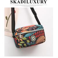 ราคา กระเป๋าผู้หญิง กระเป๋าสะพายข้าง มีลายดอกไม้สวยๆ กระเป๋าผ้า 2ซิป ยาว18 11 6 (21856763689)