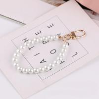 ราคา สายรัดข้อมือไข่มุกกระเป๋ารอยัลแบ็กเกอร์ (22571687515)