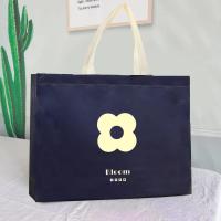 ราคา หูจับกระเป๋าช้อปปิ้งบรรจุภัณฑ์ลายดอกไม้1ชิ้นกระเป๋าผ้าใยสังเคราะห์กันน้ำกระเป๋าถือสำหรับร้านขายเสื้อผ้าสีดำ (22277589850)