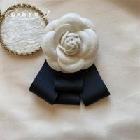 ราคา เข็มกลัดดอกไม้คาเมลเลียใหม่เข็มกลัดผูกโบว์กำมะหยี่สำหรับผู้หญิงเสื้อสไตล์วิทยาลัยเข็มกลัดติดปกเสื้อสำหรับงานแต่งงานแนววินเทจสำหรับผู้หญิง (22606235179)