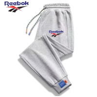 ราคา Reebok Reebok Reebok กางเกงกีฬาผู้ชายของแท้กางเกงขายาวแบบหลวมสำหรับวัยรุ่นกางเกงสำหรับใส่กางเกงขายาวใส่เล่น (19756942391)