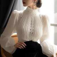 ราคา เสื้อผู้หญิงแขนยาวสีขาวใหม่เสื้อคอตั้งแขนพองดูดี (21920894530)