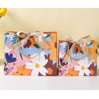 ราคา ถุงกระดาษ ถุงของขวัญ โบว์ 2 สี ใส่ของรับไหว้ ลายดอกไม้ ฟ้าอมเทา (22774464266)