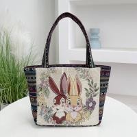 ราคา กระเป๋าผ้าแคนวาสปักลายพร้อมผ้าไหมสีทองสองด้านเย็บกระเป๋าหนังสือนักเรียนการ์ตูนกระต่ายออกแบบกระเป๋าสะพายไหล่เดี่ยว (22683880857)