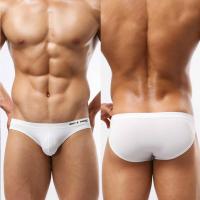 ราคา กางเกงว่ายน้ำทรงสามเหลี่ยมเอวต่ำเซ็กซี่สำหรับผู้ชายกางเกงว่ายน้ำชายหาดสีขาวสีดำล้วนรัดรูปผ้ายืดรัดรูปผ้าลื่นกางเกงว่ายน้ำน้ำพุร้อน (7973525258)