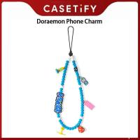 ราคา เคสมือถือสายชาร์จมือถือโดราเอมอนของแท้เคสโทรศัพท์สร้อยข้อมือสั้นกันหายอุปกรณ์เสริมสำหรับสายโทรศัพท์ (22428691612)