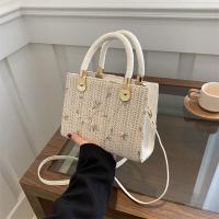 ราคา กระเป๋าฟางสานผู้หญิงกระเป๋าทรงสี่เหลี่ยมใบเล็กแบบถือถักแฟชั่นแบบใหม่ฤดูใบไม้ผลิปี2024กระเป๋าสะพายไหล่สะพายข้างลูกไม้ (22040782084)