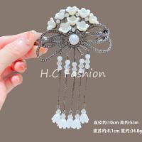 ราคา The New High End Lily Of The Valley Tassel Hairpin Womens Light Luxury Temperament Twist Clip Back Of The Head Spring Clip Hairpin (22571924688)