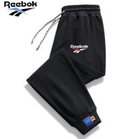 ราคา Reebok Reebok Reebok กางเกงกีฬาผู้ชายของแท้กางเกงขายาวแบบหลวมสำหรับวัยรุ่นกางเกงสำหรับใส่กางเกงขายาวใส่เล่น (19756942398)