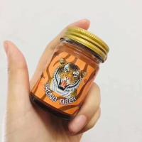 ราคา Thong Tiger ขนาด 50g ยาหม่องตราเสือแก้ปวดเมื่อย 1 ขวด (12546435645)
