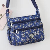 ราคา กระเป๋าสะพายข้างผ้าไนลอนความจุขนาดใหญ่สำหรับผู้หญิง กระเป๋าสะพายไหล่แบบหนังสือ กางเกงยีนส์ลายสก็อตสไตล์ยุโรปและอเมริกัน กระเป๋าสะพายข้างแบบมีซิป (23502902870)