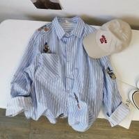 ราคา เสื้อเชิ้ตแขนยาวลายทางสีน้ำเงินขาวลายการ์ตูนปักขนาดใหญ่สำหรับผู้หญิงไซส์ใหญ่ ทรงหลวม สไตล์เกาหลี ฤดูใบไม้ผลิ 2024 (21962447173)