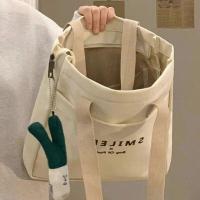 ราคา กระเป๋าผ้าใบสะพายไหล่ข้างเดียวสำหรับนักเรียนหญิง ความจุขนาดใหญ่ กระเป๋าถือผ้าใบสำหรับเดินทางไปโรงเรียน กระเป๋าสะพายข้างหนังสือ กระเป๋าผ้าใบสำหรับเดินทาง 2023 กระเป๋าสะพายข้างแบบใหม่ (23146559900)