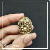 ราคา พระพิฆเนศ เหรียญพระพิฆเนศ ด้านหลังสัญลักษณ์โอม เนื้อทองเหลืองรมดำ ผ่านพิธีใหญ่วัดพระแก้ววังหน้า (13215834256)