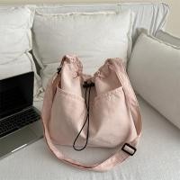 ราคา koreafashionshop KR2069 กระเป๋าสะพายข้างผ้าร่มสีพื้น ด้านหน้ามี2ช่องใส่ของ (22476302109)