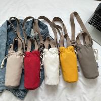 ราคา Universal สีขาว กระเป๋าสะพายข้างที่วางแก้วน้ําผ้าแคนวาส เชือกรูด กระเป๋าถือ Bucket ใหม่ 2023 ผู้หญิง มีสไตล์ กระเป๋าสะพายไหล่ (22262159403)