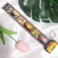 ราคา พวงกุญแจกลักฟิล์ม ม้วนฟิล์ม ใส่รูปได้ 6 10 รูป พร้อมถุงผ้า งานแฮนเมด งานฝีมือ ของขวัญ ของฝาก ของชำร่วย (12668143848)