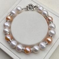 ราคา สร้อยข้อมือไข่มุกแท้ มุกภูเก็ต สีขาวคั่นบอลเพชรตัดด้วยไข่มุกสีส้มพีช (4702700813)