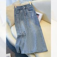 ราคา กระโปรงยีนส์เอวสูงปักลายสไตล์จีนสำหรับผู้หญิง ฤดูร้อน 2025 กระโปรงทรงเอยาวปานกลางแบบใหม่ กระโปรงเดินข้ามข้างเดียว ทรงหลวม สไตล์สาว (24937035435)