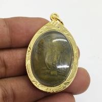 ราคา เหรียญรุ่นแรก หลวงปู่ไข่ วัดเชิงเลน กรุงเทพ เนื้อทองแดงหลังเรียบ พร้อมเลี่ยมกรอบทองไมครอน (11244052241)