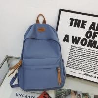 ราคา กระเป๋านักเรียนสีทึบ 2025 ผู้หญิงเกาหลีแบบเรียบง่ายร้อยชุดนักเรียนมัธยมศึกษาตอนต้นนักเรียนกระเป๋าเป้สะพายหลังความจุขนาดใหญ่ (23270409709)