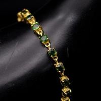 ราคา สร้อยข้อมือพลอยเขียวส่องจันทบุรี Green Sapphire ตัวเรือนเงินแท้92 5 ชุบทอง พลอยสวยสะอาด สีเขียว (23693317048)