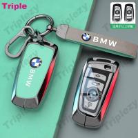 ราคา พวงกุญแจโลหะผสมสังกะสีปกสำหรับ BMW เคสกุญแจรถยนต์ M5 F30 F10 118i 320i 1 3 5 7ซีรีส์ X3 F25 M3 X4พวงกุญแจเปลือกที่ใส่อุปกรณ์เสริม Nappa Cowhide หนังแท้ TPU ป้องกัน (22149479111)
