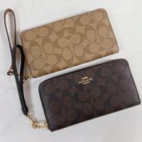 ราคา Coach C4452 Long Zip Around Wallet In Signature Canvas กระเป๋าสตางค์คล้องมือ