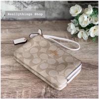 ราคา กระเป๋าคล้องมือCoach 2 ซิปไซส์ S Coach Signature DoubIe Zip WristIet (10144897074)