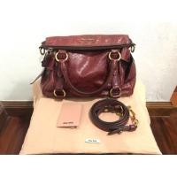 ราคา Miu Miu mini bow bag Authentic % มีสายยาว Crossbody สภาพสวย มีถุงผ้า การ์ด (1229144828)