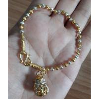 ราคา สร้อยข้อมือพร้อมจี้ถุงเงินถุงทองนพเก้า ด้านในมีพลอย9สี สีสองกษัตริย์ G0353 (1149889319)