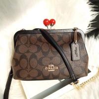 ราคา กระเป๋าสะพาย COACH C1452 NORA KISSLOCK CROSSBODY IN SIGNATURE CANVAS (7579299976)