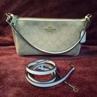 ราคา ลดหนักมาก!!! Coach pouch สีขาว hiend (1278276916)