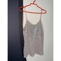 ราคา ส่งต่อเสื้อสายเดี่ยวปักเลื่อมสีเงิน สายปรับได้ size M (22671480934)