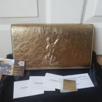 ราคา Like new Ysl clutch สีgold 2017 แท้100% (6642768430)