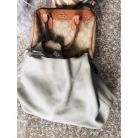 ราคา กระเป๋ามือสองหนังวัวแท้mk หมอนโคช (19353197710)