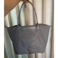 ราคา กระเป๋า longchamp มือสองของแท้ 100% สีฟ้า ไซส์ M หูยาว (12356801984)