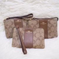 ราคา พร้อมส่ง #COACH #F58035 CORNER ZIP WRISTLET IN SIGNATURE COATED CANVAS WITH LEATHER STRIPE (2858493679)